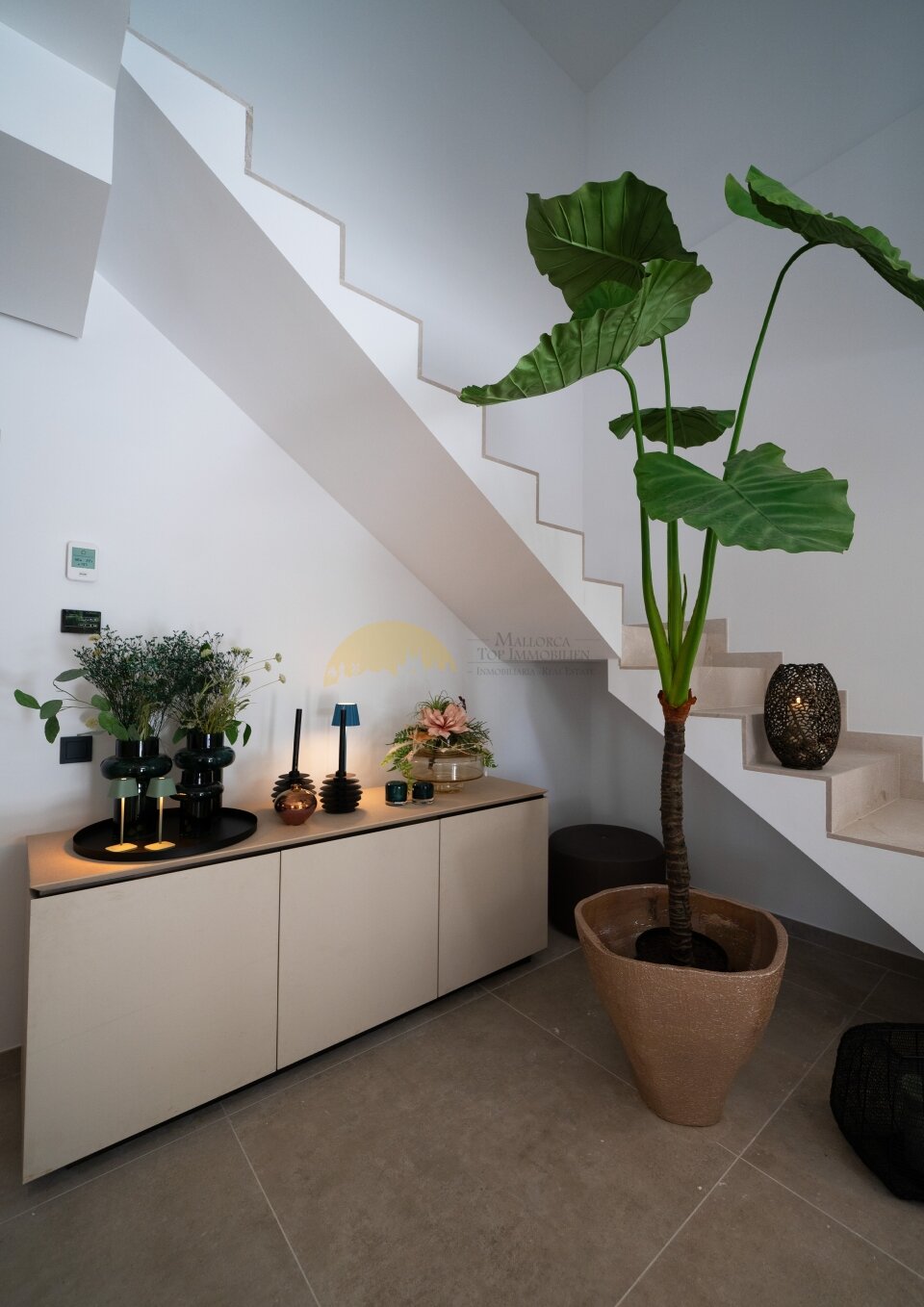 Elegant staircase with integrated niche and optimal space utilization