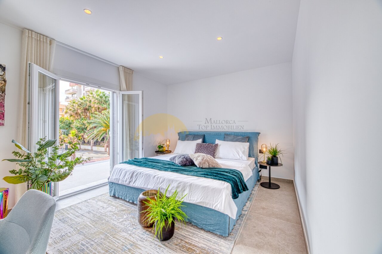 Main bedroom with direct terrace access and high-quality furnishings