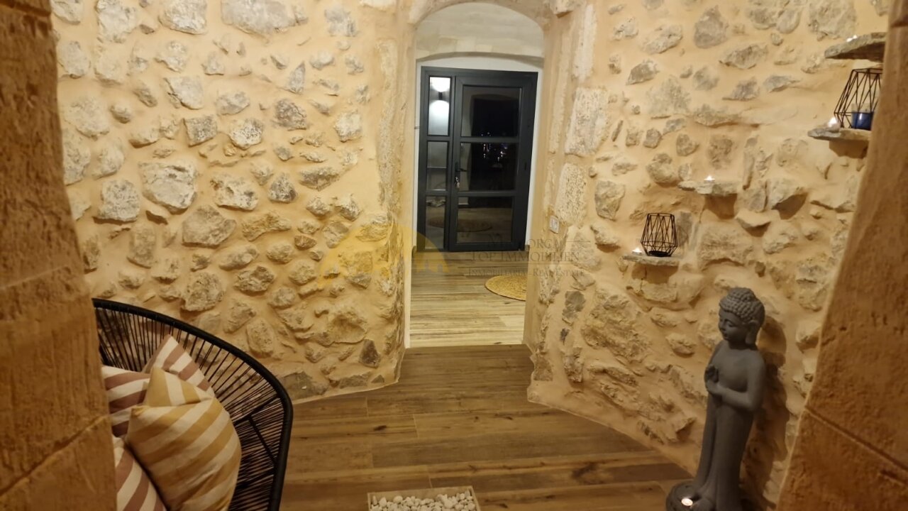 Corridor with authentic natural stone character and large-scale vaulted elements Corridor with authentic natural stone character and large-scale vaulted elements