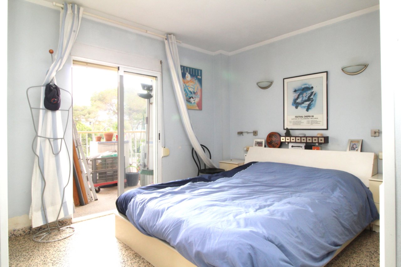Bright bedroom with direct terrace access and large glass windows Bright bedroom with direct terrace access and large glass windows