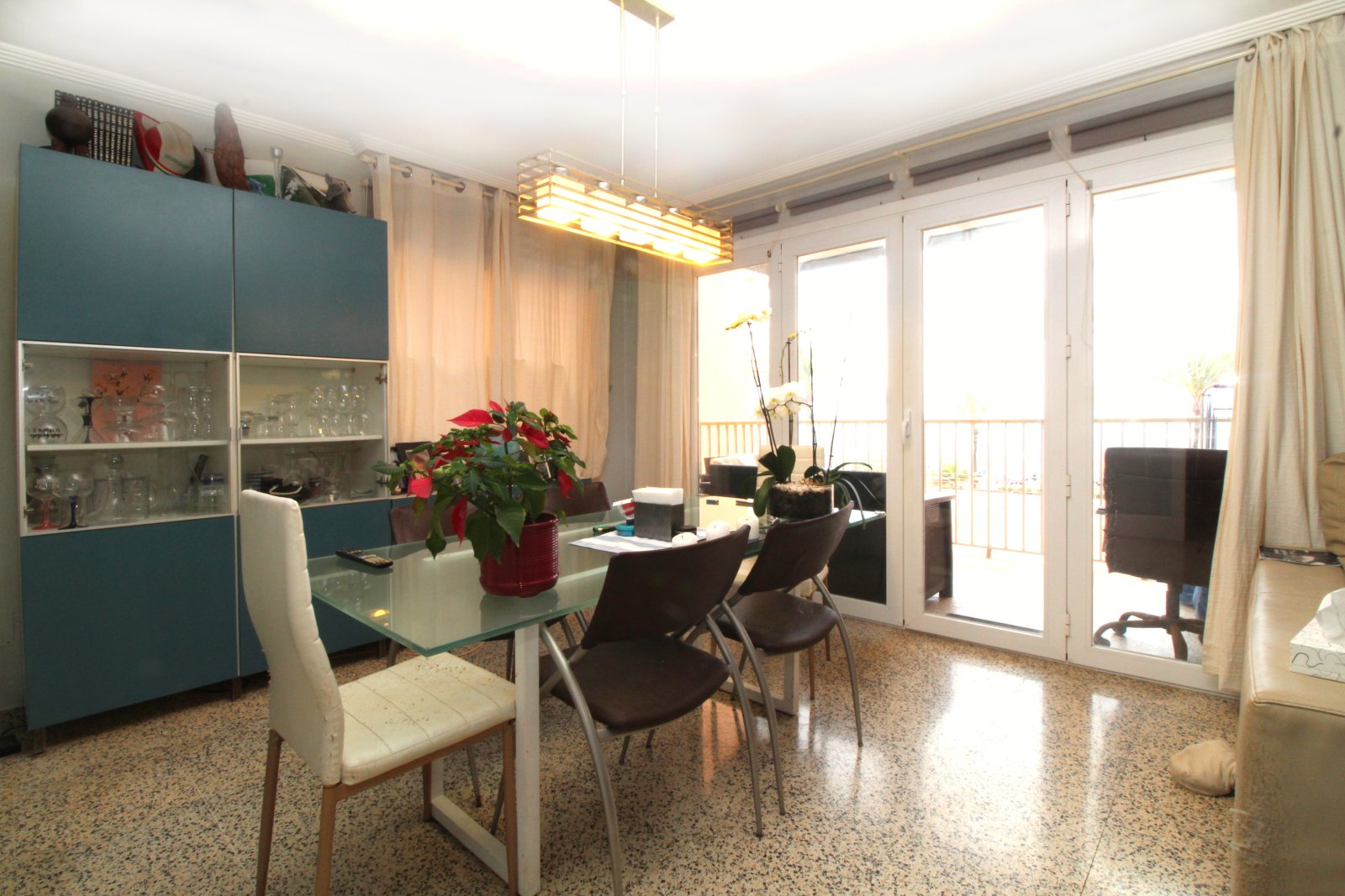 Bright living-dining room with direct terrace access and large windows Bright living-dining room with direct terrace access and large windows