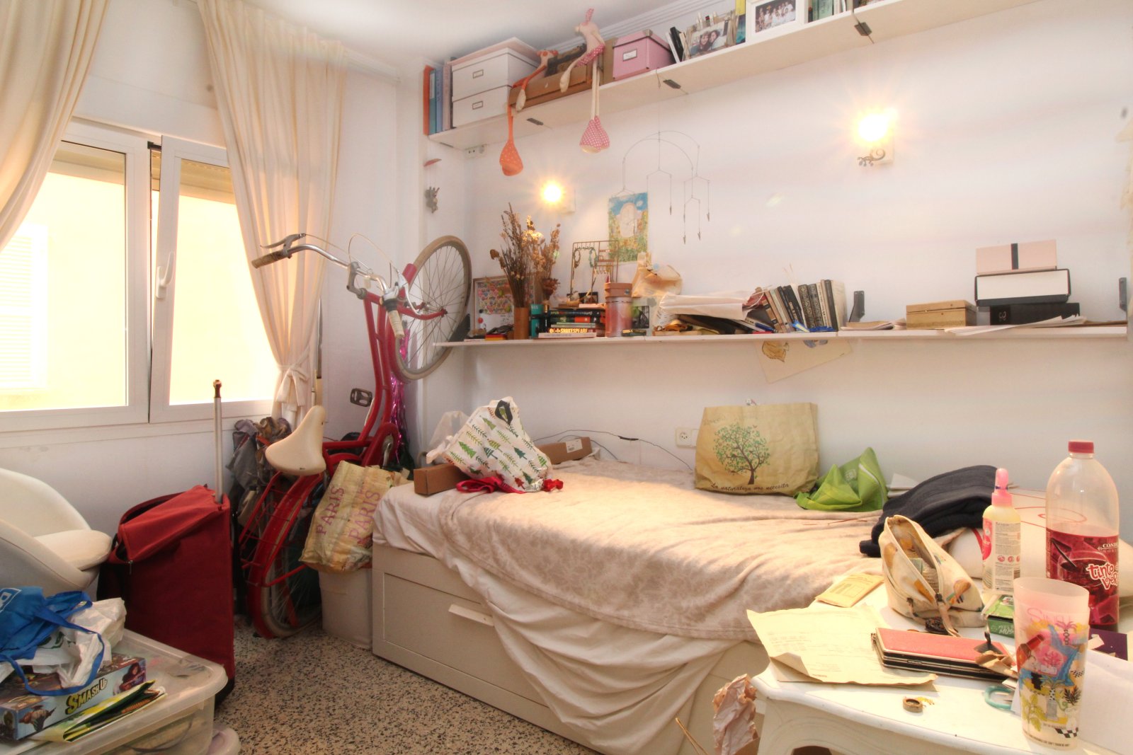 Teenager's room with smart wall utilization and ample storage space Teenager's room with smart wall utilization and ample storage space