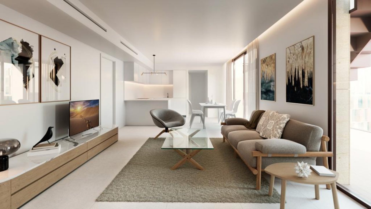 Living room with open floor plan and large sliding doors – seamless connection to balcony and dining area Living room with open floor plan and large sliding doors – seamless connection to balcony and dining area