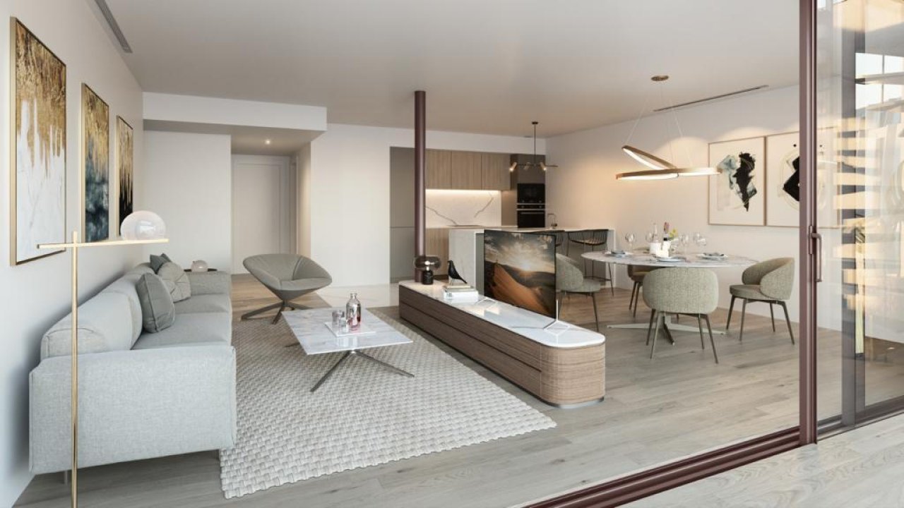 Living and dining area with floor-to-ceiling glazing and a flexible floor plan concept Living and dining area with floor-to-ceiling glazing and a flexible floor plan concept