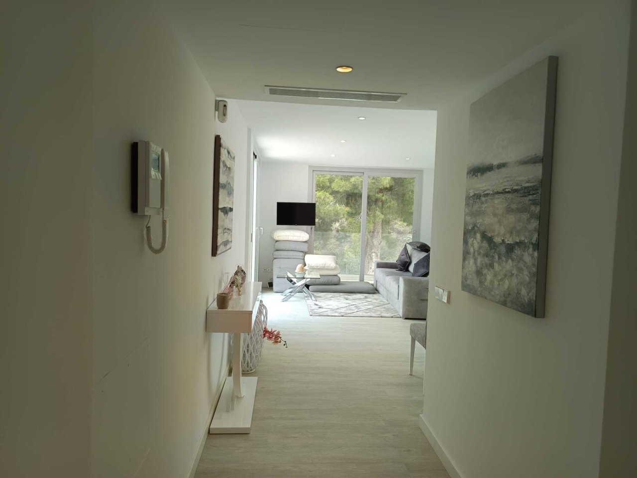 Elegant hallway area with open space connection and modern ceiling design Elegant hallway area with open space connection and modern ceiling design