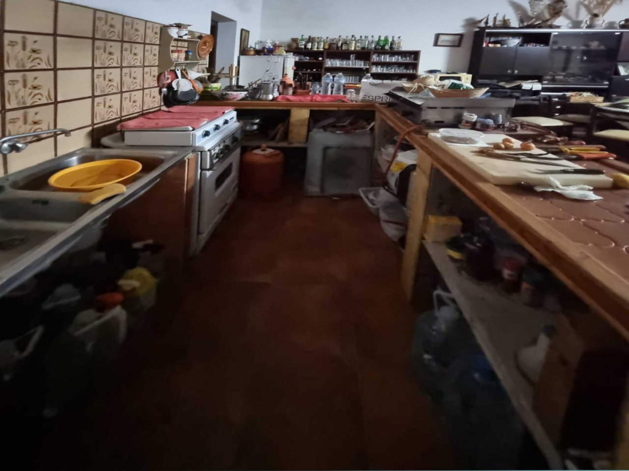 Functional kitchen with ample workspace and practical cooking equipment Functional kitchen with ample workspace and practical cooking equipment