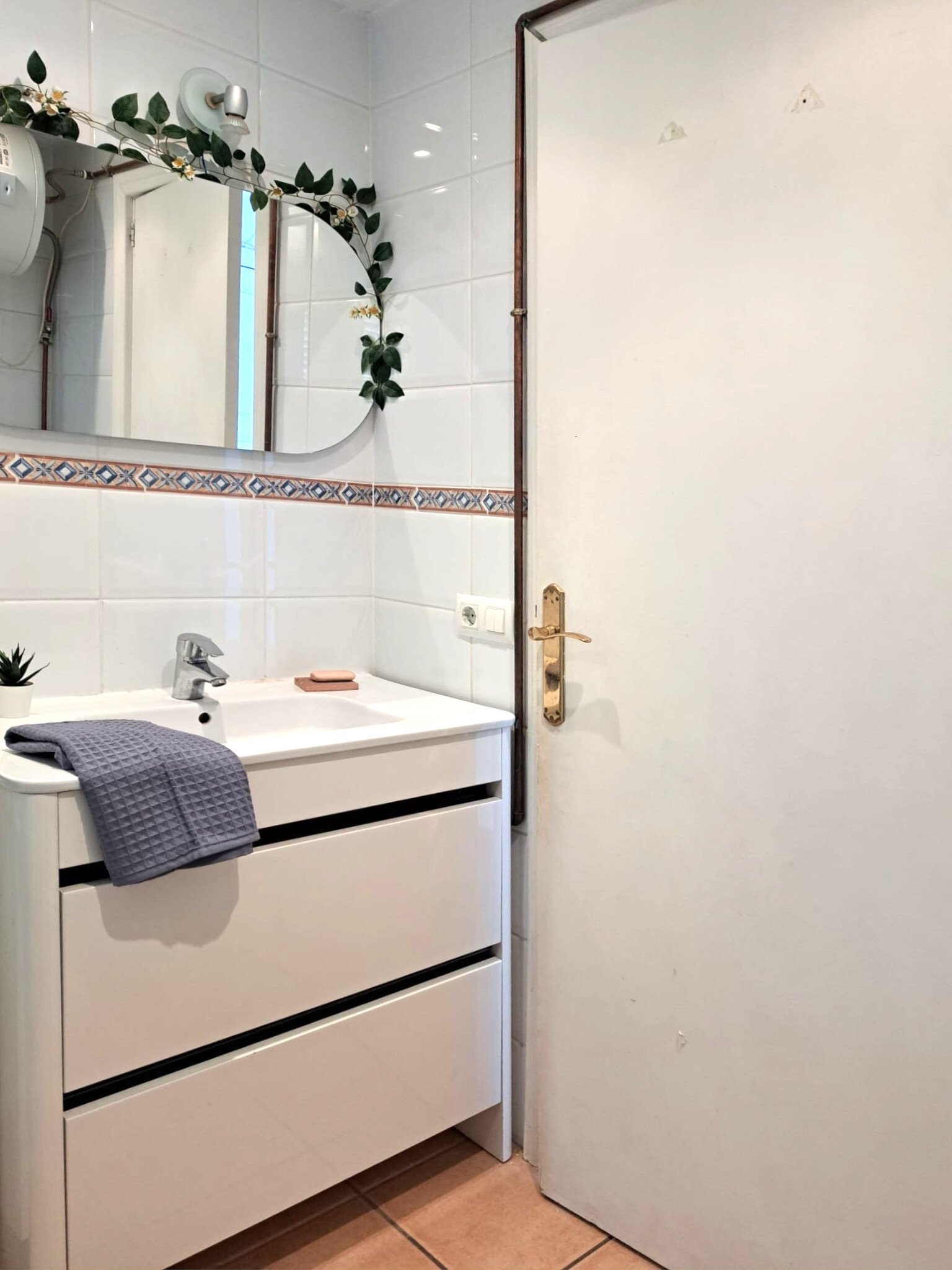 Modern bathroom with high-quality fixtures and practical storage integration Modern bathroom with high-quality fixtures and practical storage integration