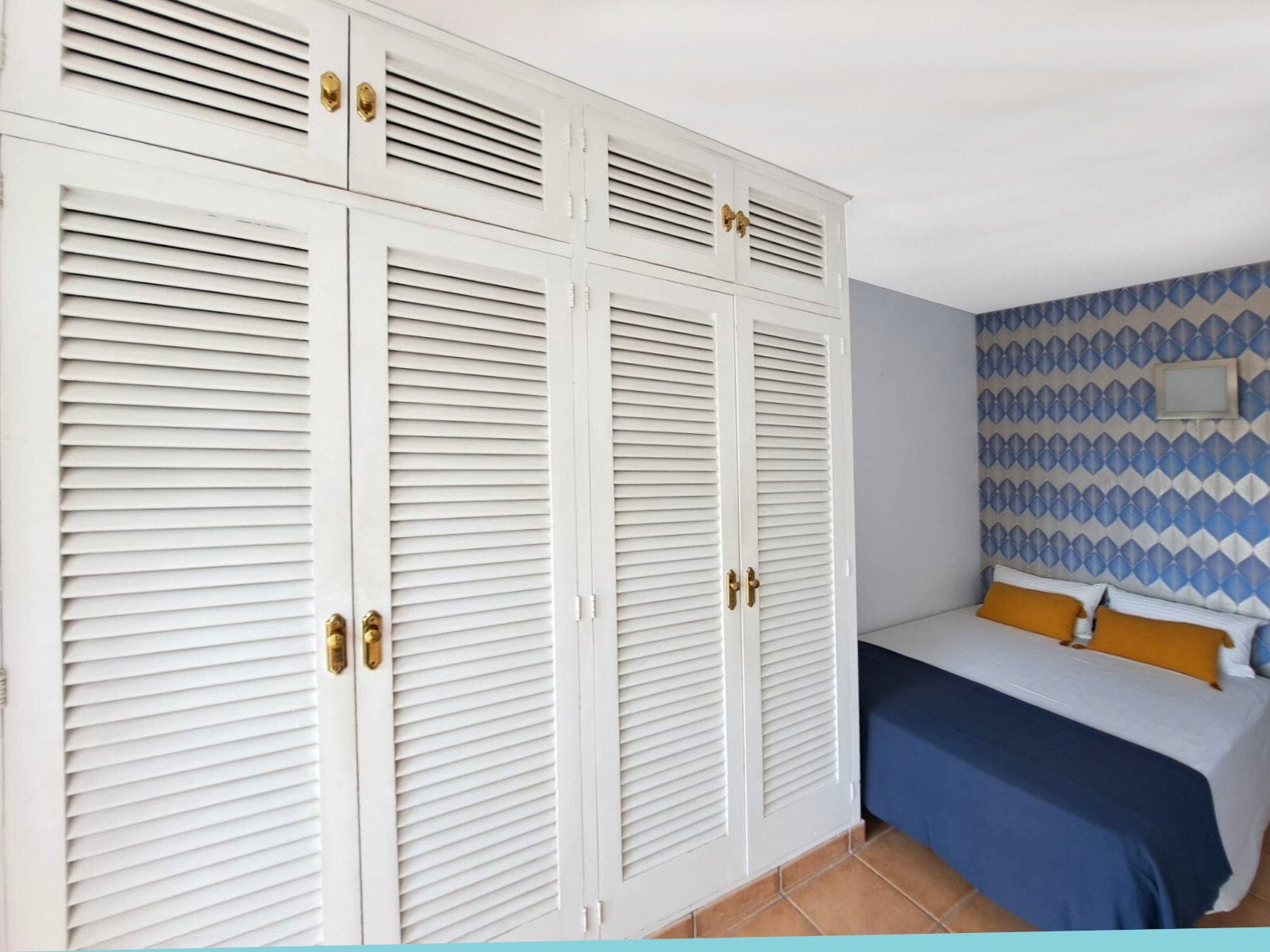 Bedroom with extensive wardrobe system – optimal storage solution Bedroom with extensive wardrobe system – optimal storage solution