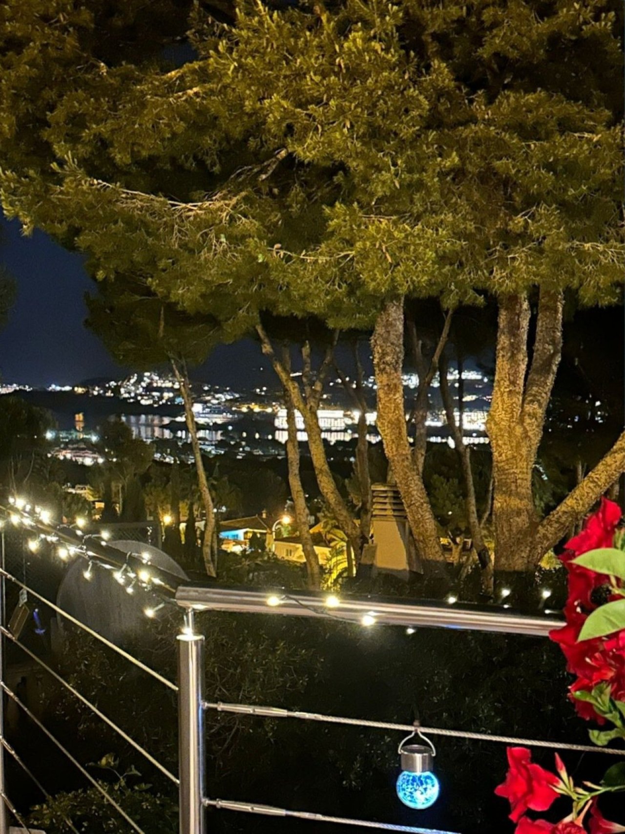 Terrace gallery with panoramic view and illuminated staircase