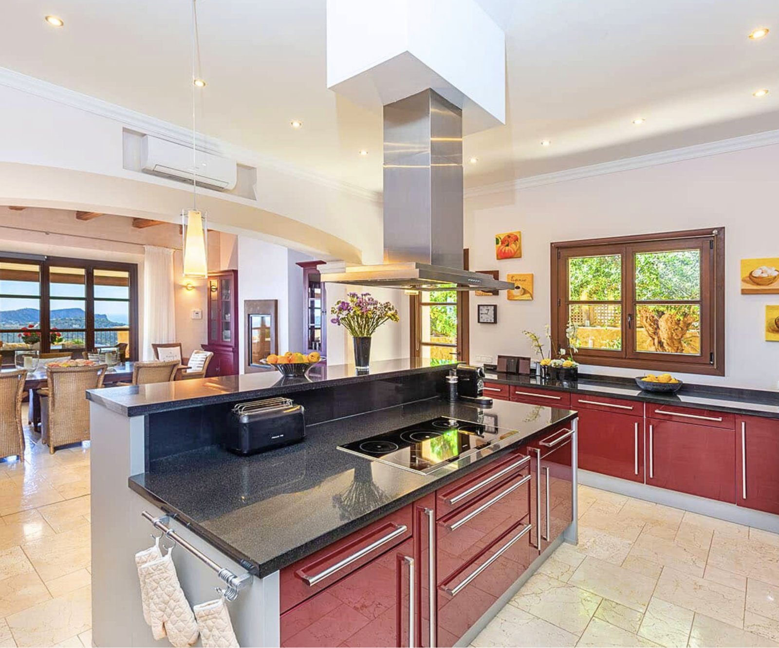 Modern kitchen with central island and smart connection to the living area
