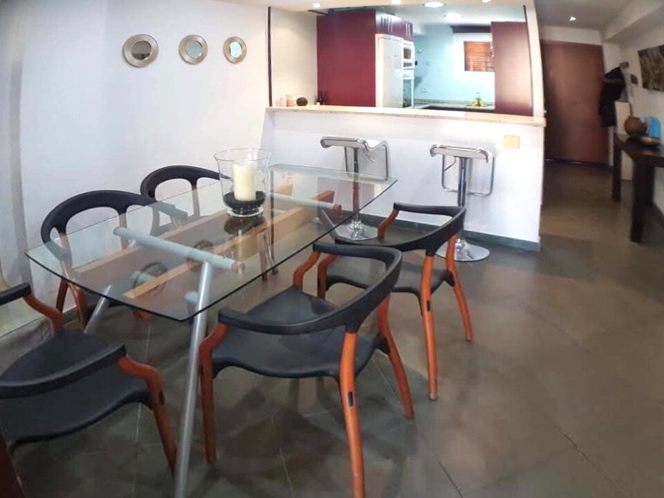 Open kitchen with integrated dining area and thoughtful layout Open kitchen with integrated dining area and thoughtful layout