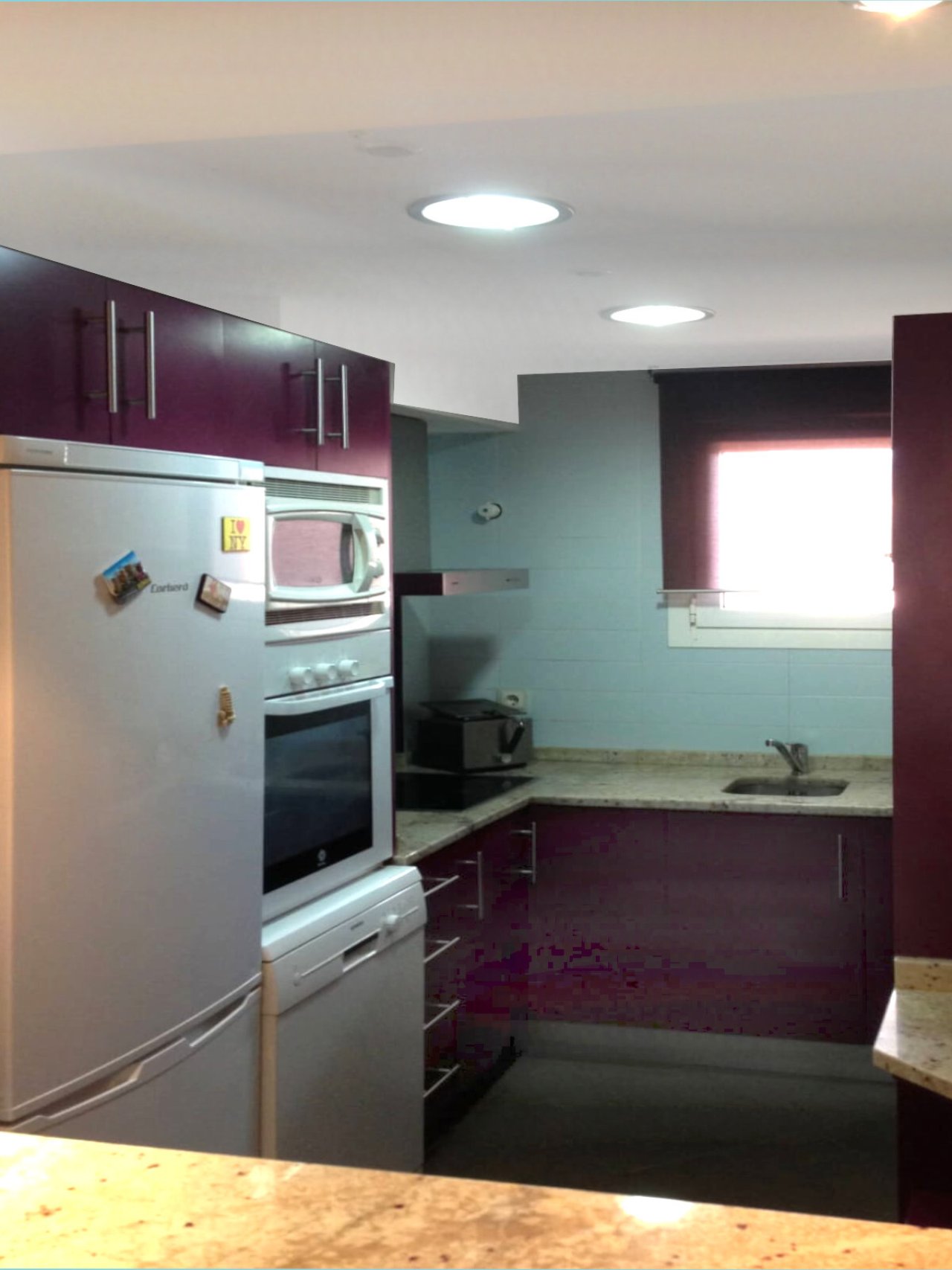 Modern kitchen with high-quality built-in appliances and optimal workspace design Modern kitchen with high-quality built-in appliances and optimal workspace design