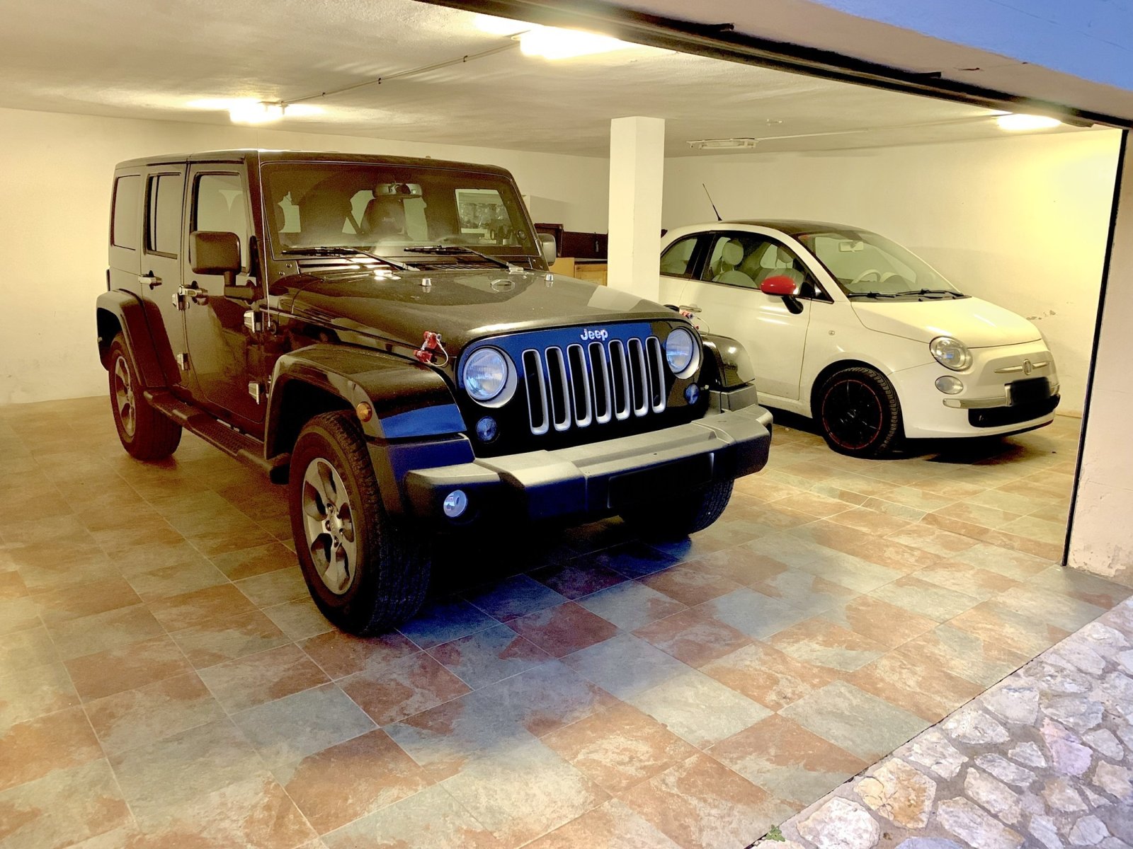High-quality underground parking with retractable roller shutter systems and optimal space utilization
