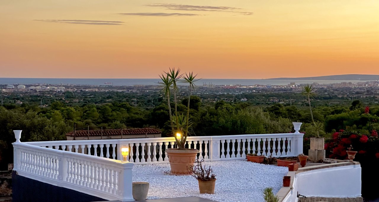 Spectacular rooftop terrace with elegant balustrade and breathtaking panoramic view of the landscape