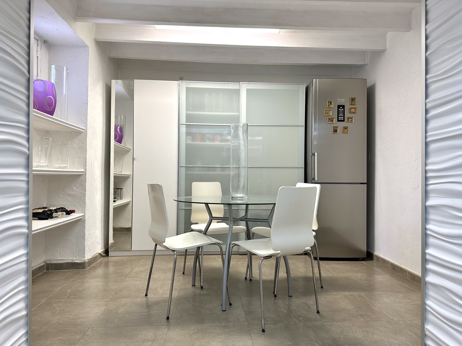 Modern kitchen with practical layout and extensive storage integration