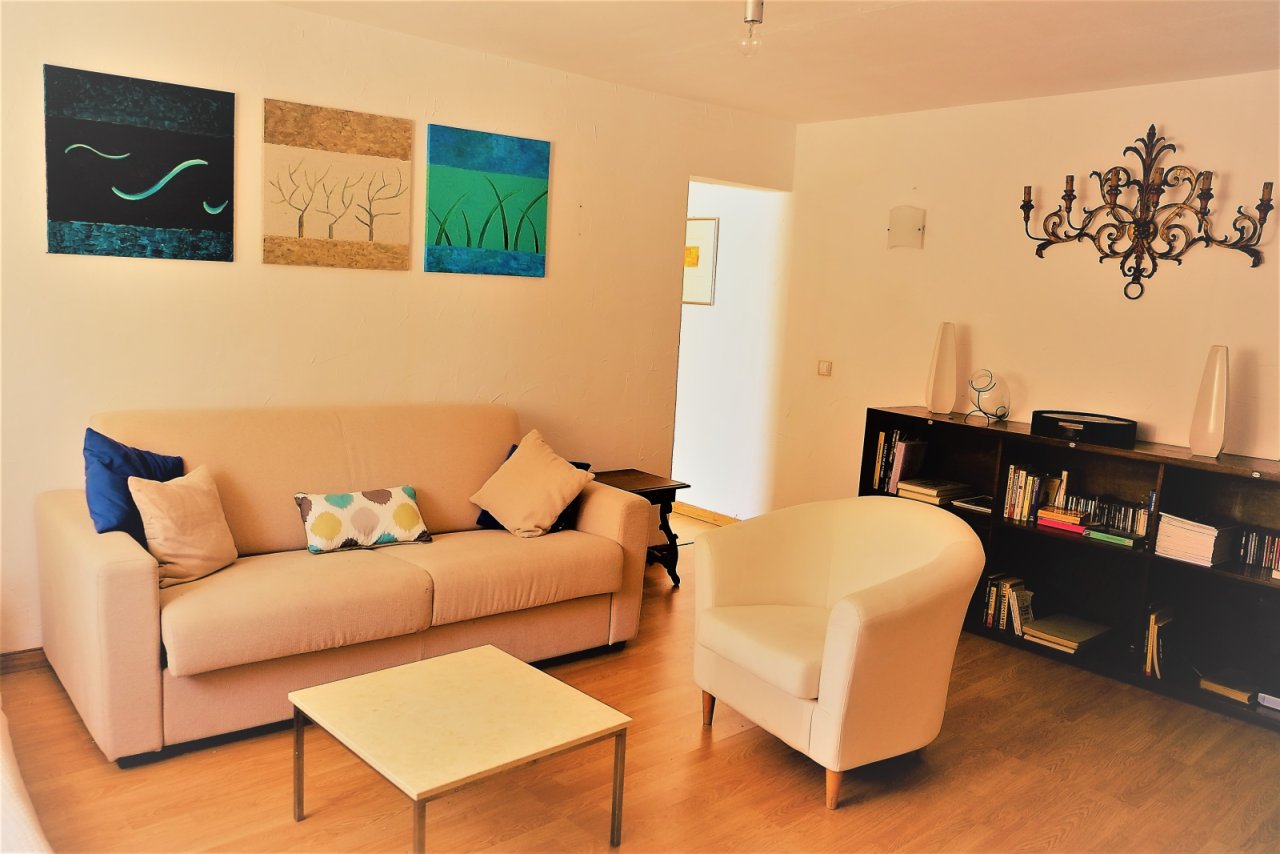 Bright living room with high ceiling design and practical layout