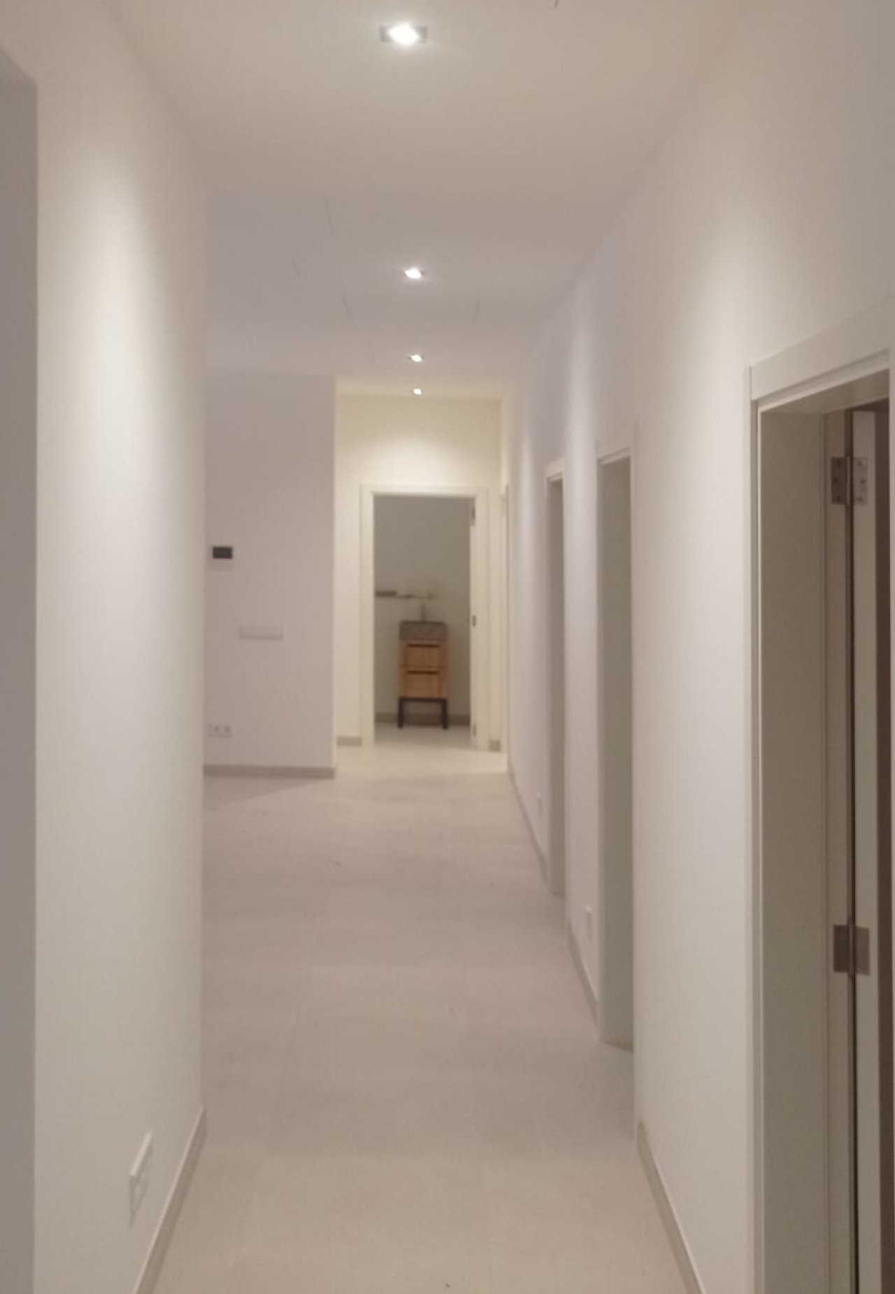 Intelligent corridor design with optimal space utilization and professional lighting concept