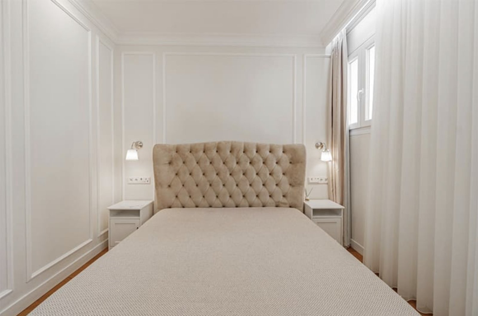 Elegant bedroom with thoughtful storage and natural brightness