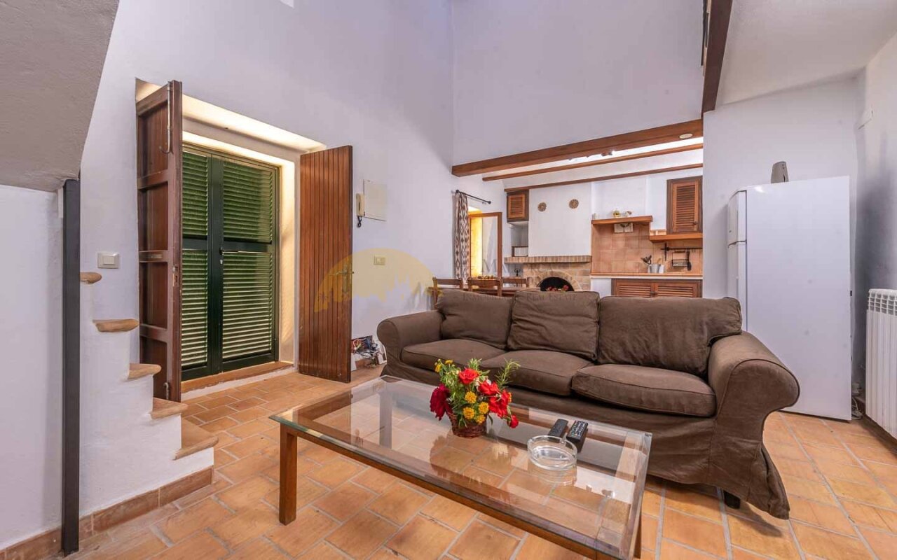 Open living concept with direct access to the terrace – living and kitchen areas harmoniously connected