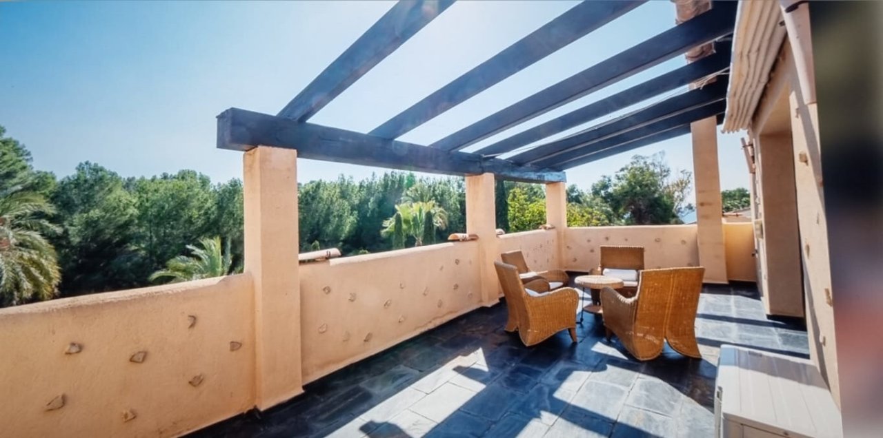 Exclusive rooftop terrace with pergola covering and panoramic landscape view Exclusive rooftop terrace with pergola covering and panoramic landscape view