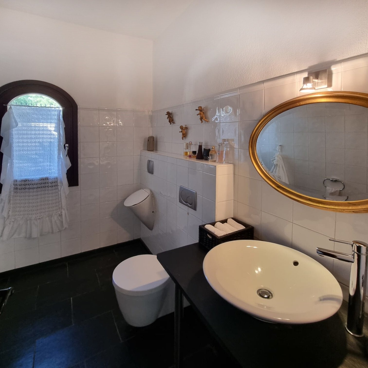 Modern bathroom with separate toilet, double washbasin, and high-quality furnishings Modern bathroom with separate toilet, double washbasin, and high-quality furnishings