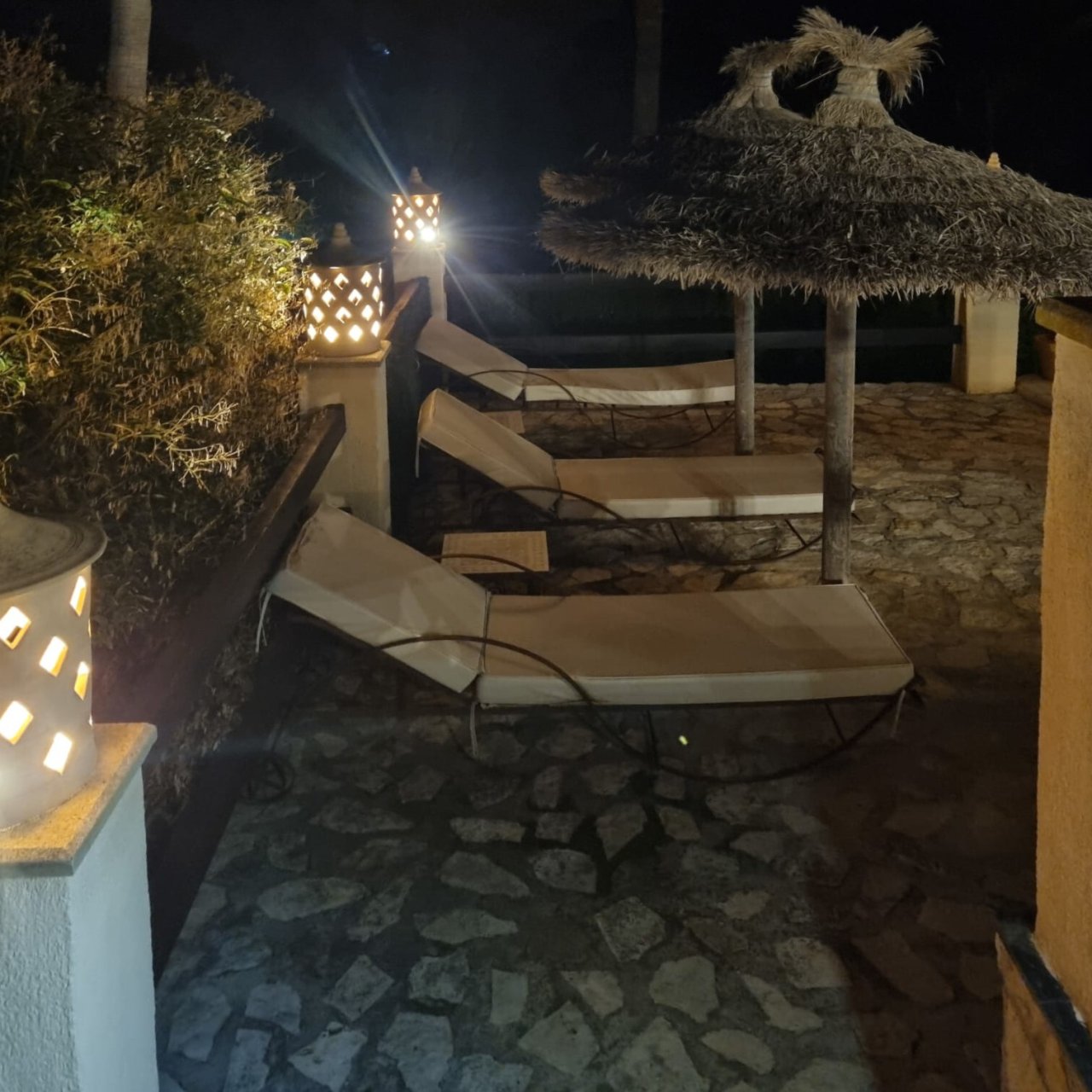 Beach nearby relaxation zone with professional night lighting and covered lounge area Beach nearby relaxation zone with professional night lighting and covered lounge area