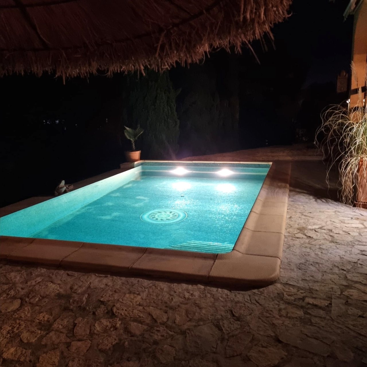 Illuminated pool area with professional LED equipment and large terrace space Illuminated pool area with professional LED equipment and large terrace space