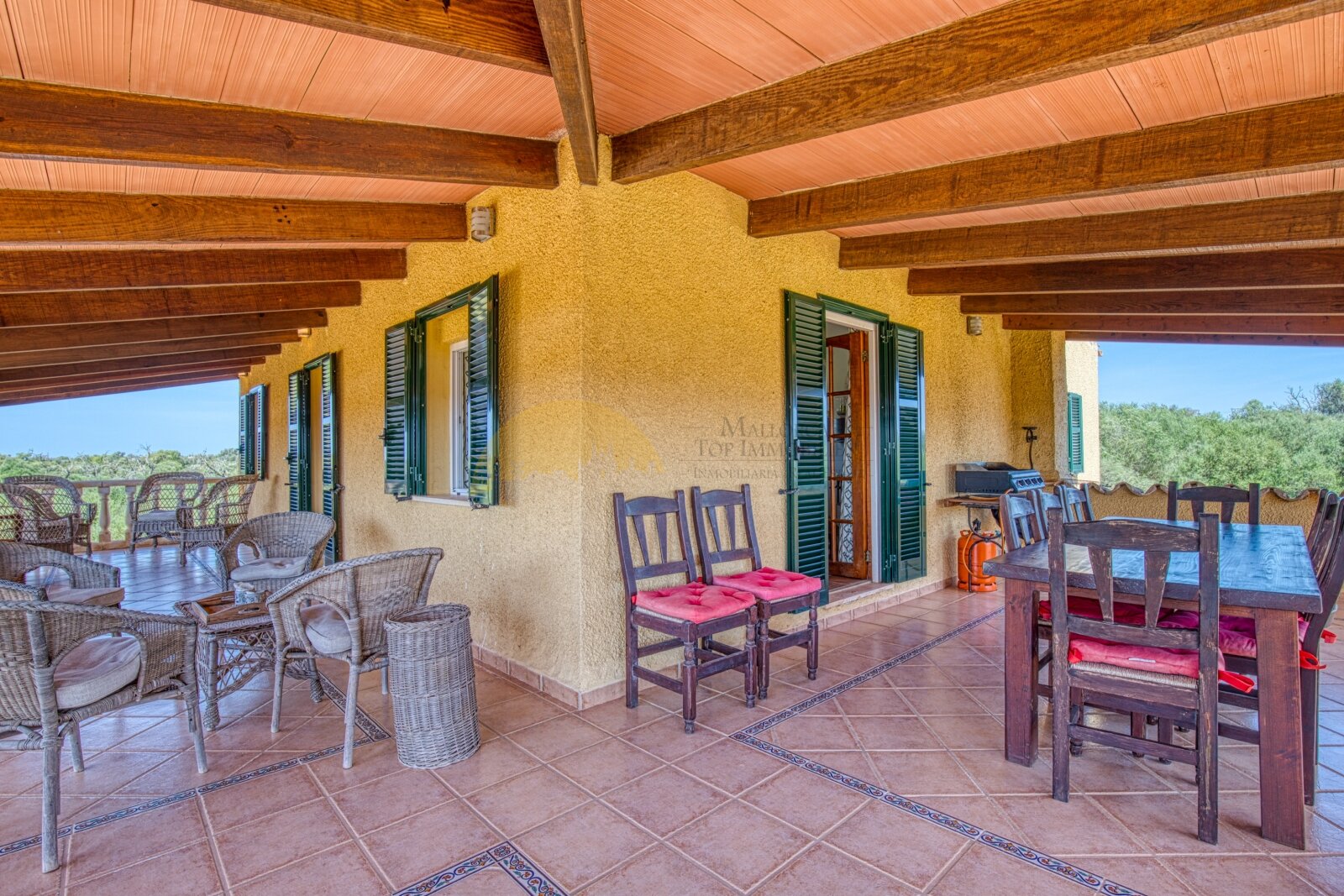 Covered loggias with solid wooden beams and open landscape view Covered loggias with solid wooden beams and open landscape view