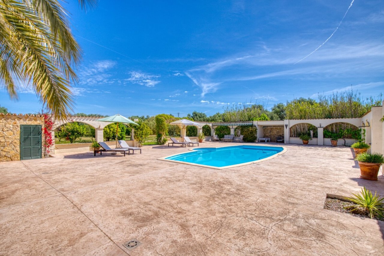 Pool area with elegant arcades and a spacious sun terrace Pool area with elegant arcades and a spacious sun terrace
