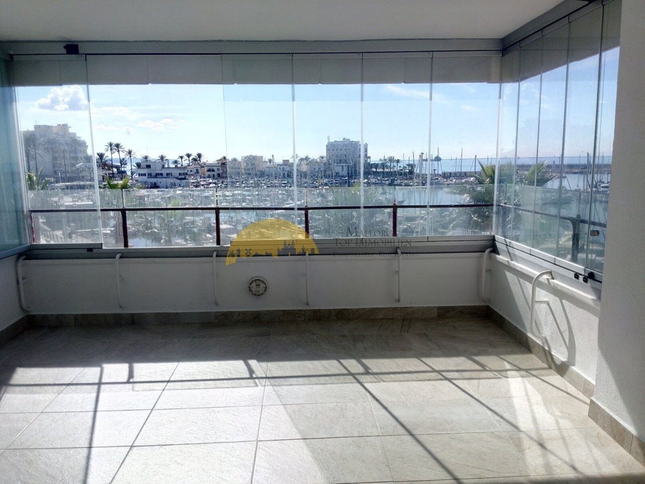 Panoramic terrace with unobstructed harbor view and all-around glazing