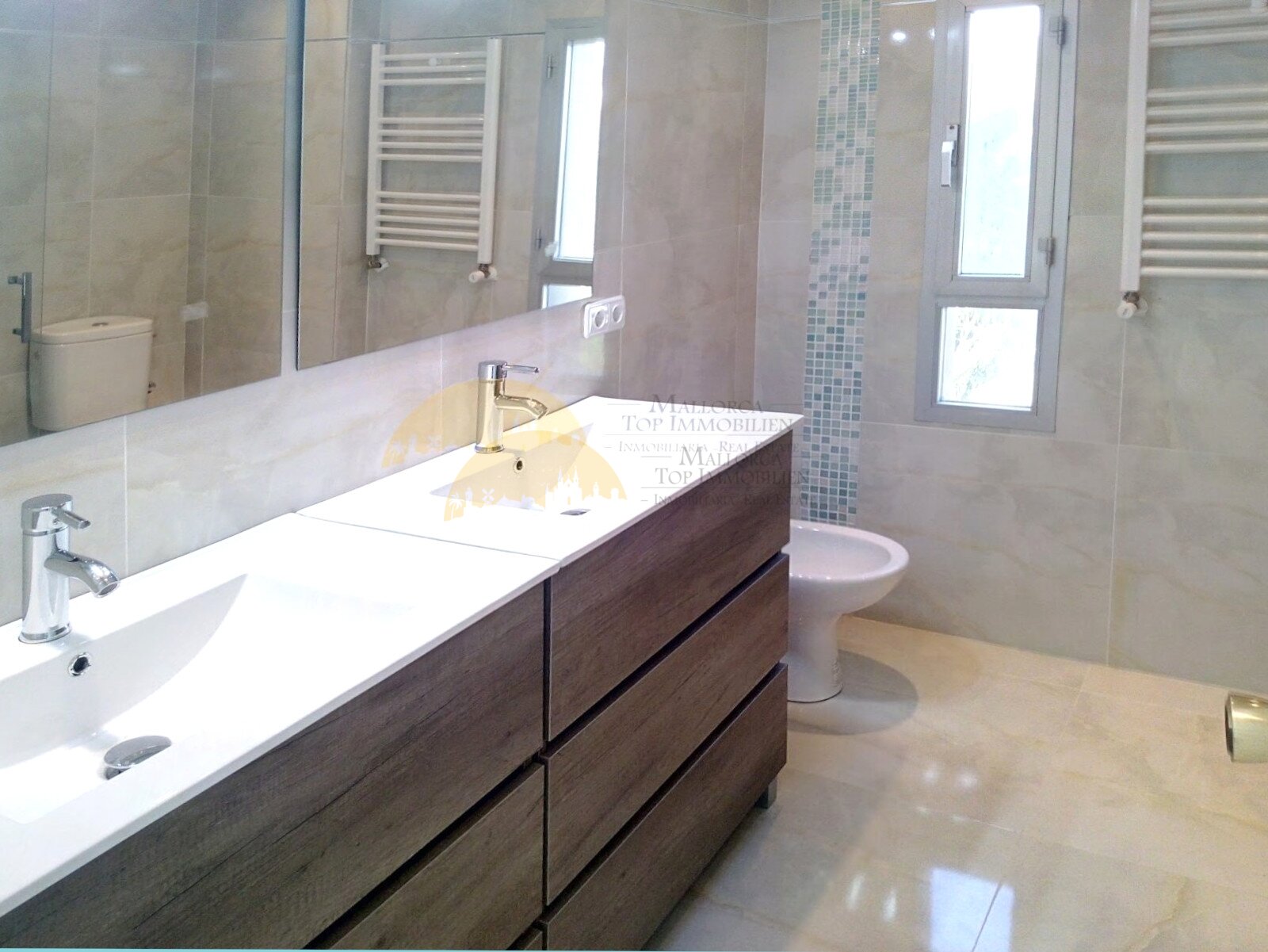 Elegant double vanity bathroom with large mirror installation and walk-in shower