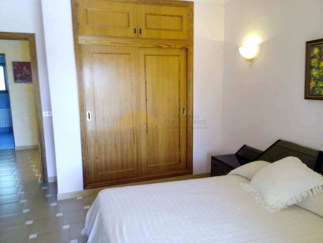 Bedroom with high-quality built-in wardrobes and optimal space utilization