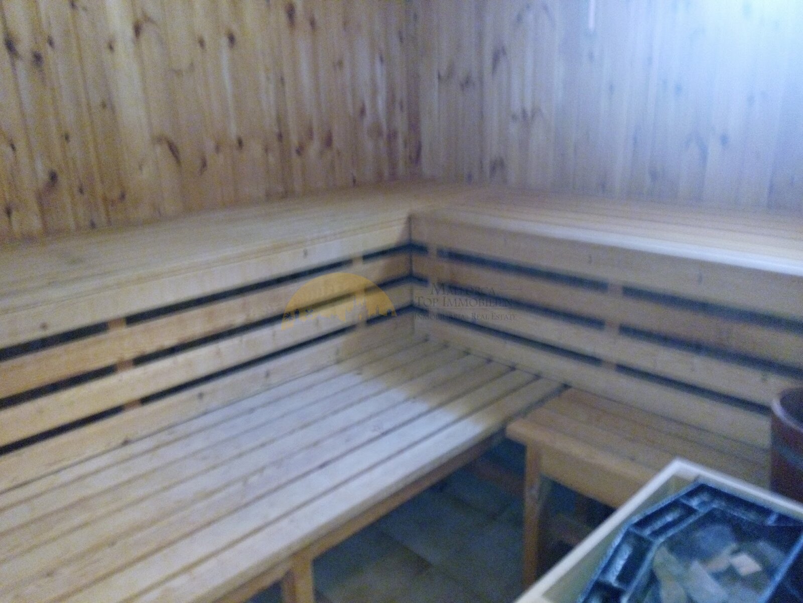 Finnish sauna with authentic wooden furnishings and professional infrared heating system