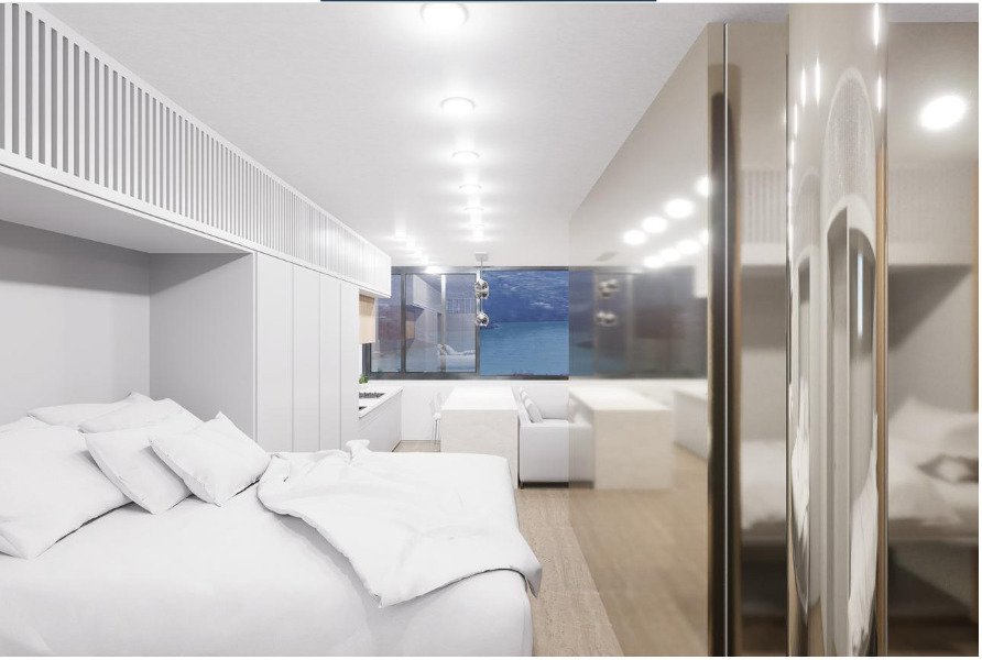Área de dormir con vestidor integrado y pared de armario con espejos