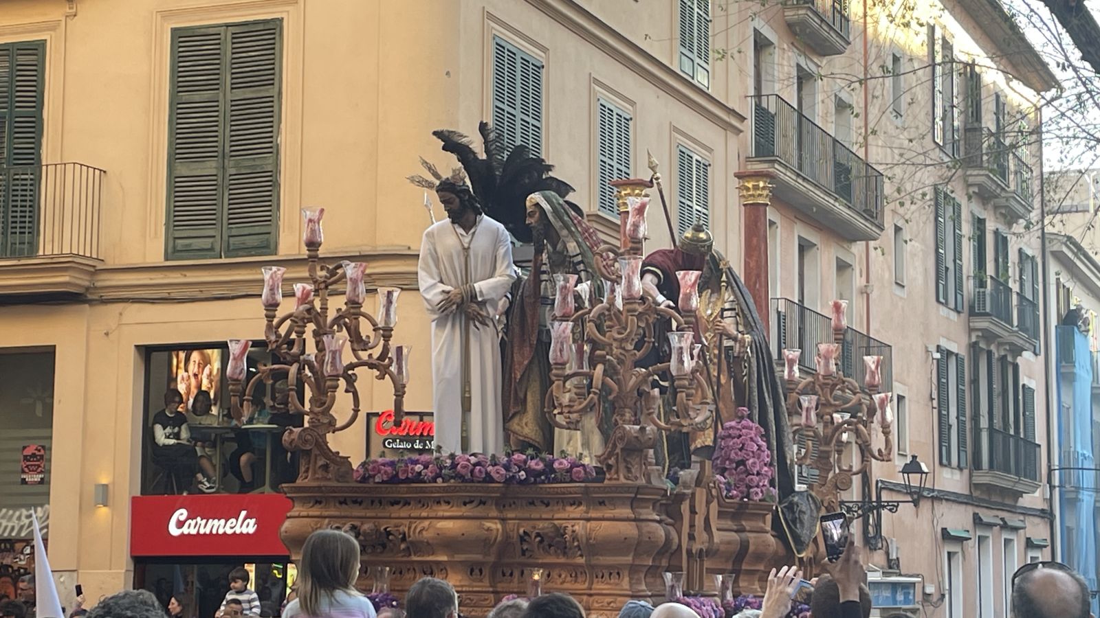 Semana Santa procession in Palma de Mallorca at dusk