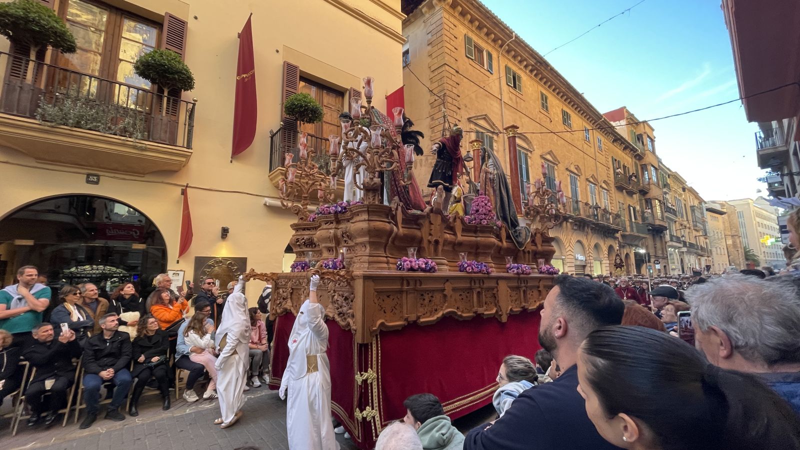Confrarias de Semana Santa in medieval robes walking through Palma's old town