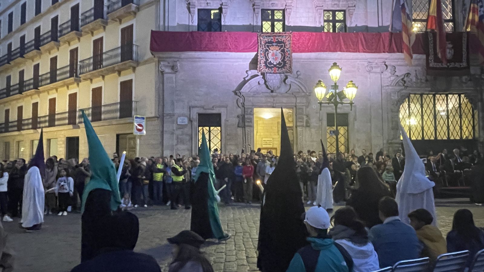 Faithful attending midnight mass after Holy Week procession